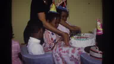 Harlem New York USA (1976): Childrens Are All Celebrating And Enjoying The