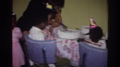 Harlem New York USA (1976): Lady Making Cake Kids Watching Near Showing Chairs