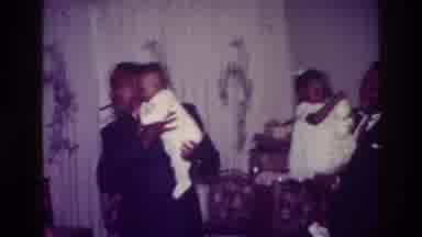 Harlem New York USA (1976): African American Men Holding Baby Girls In What Looks