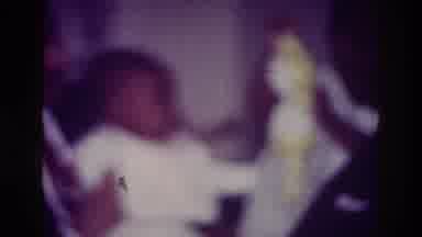Harlem New York USA (1976): Blurry Home Video Of Baby Grabbing Toy