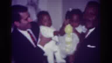 Harlem New York USA (1976): Two Men Holding Their Small Children And Smiling And