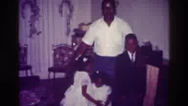 Harlem New York USA (1976): A Father Poses With His Two Small Daughters And A Son