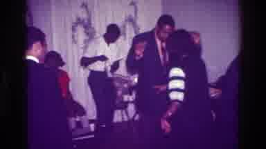 Harlem New York USA (1976): Couple Dancing At Evening Home Party Man Opens Wine