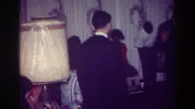 Harlem New York USA (1976): A Gathering And A Man And Women Dancing As Another Man