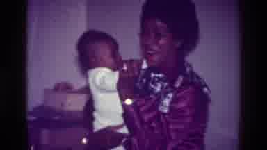 Harlem New York USA (1976): A Black Woman Happily Smiles As Dancing In A Sway