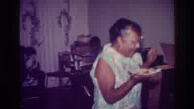 Harlem New York USA (1976): People At A Gathering Eating