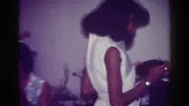 Harlem New York USA (1976): Woman And Her Family Have A Nice Day Listening To
