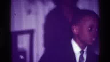Harlem New York USA (1976): A Girl With Ponytails Is Dancing With A Boy In A Suit