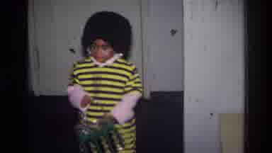 Harlem New York USA (1976): A Toddler In A Costume Walk To A Living Room And
