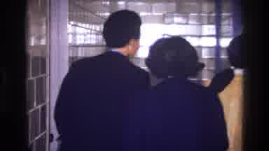 Harlem New York USA (1976): Old Group Of Colored Folks Walking Down A Hallway And