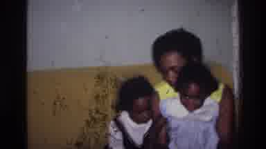 HARLEM NEW YORK USA-1976: Mother With Her Two Daughters Having A Good Time At