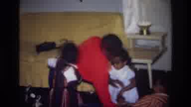 Harlem New York USA (1976): Old Home Video Of Man Playing With Kids On Floor Next