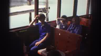 Watkins Glen New York USA-1976: People Riding On A Boat In Mountains