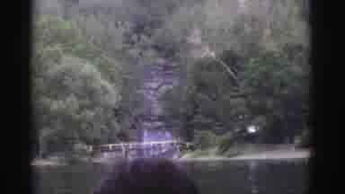 Watkins Glen New York USA (1976): Old Footage Boat On Lake Looking Up At Houses On