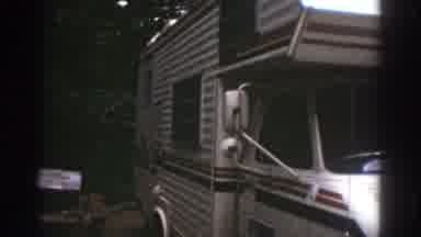 Watkins Glen New York USA (1976): Van With A Name Board Is Standing Alone Without