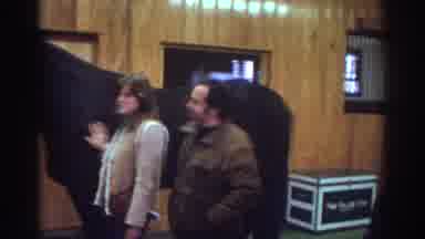 Watkins Glen New York USA (1976): People Looking At Dark Brown Horse Inside White