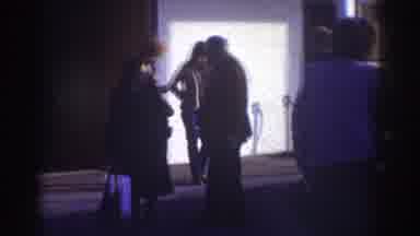 Watkins Glen New York USA (1976): People Stand Idly Outside Building And Girl
