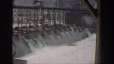 California USA (1937): Water Rushing Through The Spillways Of A Dam