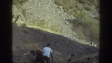 California USA (1937): Five Members Are Trying To Climb The Hill With Their Team