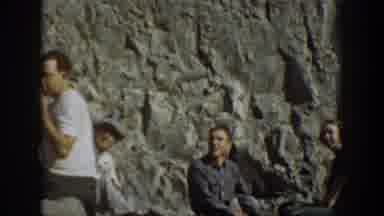 California USA (1937): Group At A Waterfall Horsing Around With Throwing Big Rocks