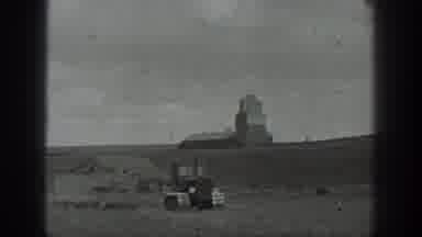 California USA (1937): Old Tractor Working In The Field