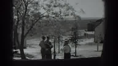California USA (1937): Three Persons Are Speaking In The Road And They Are