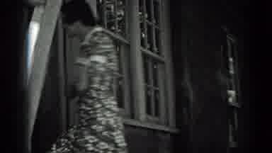 California USA (1937): Men Working Outdoors And Woman Walking Inside With Lot Of