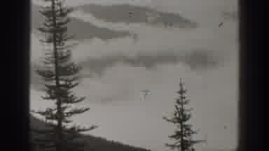 California USA (1938): Views Of Water Spilling From Dam And Mist Covered Mountains