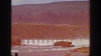 California USA (1938): Water Runs Over Expansive Dame Lined With Large