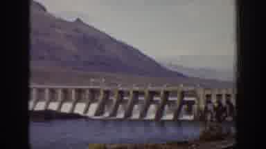 California USA (1938): A Man Is Standing Near The Dam,Opening For Agriculture