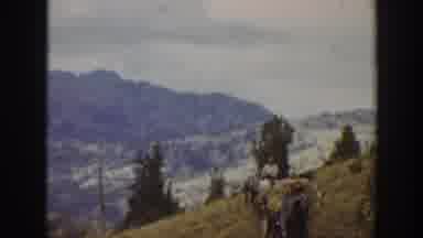 California USA (1938): Man Riding Horse Has Packmule With Mountains In Background