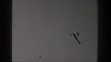 Washington USA (1938): People Watching Model Airplane Fly Over Empty Field During