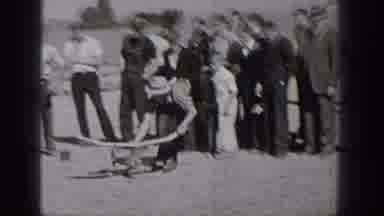 Washington USA (1938): A Man Sets A Model Airplane In Motion To Help It Take Off
