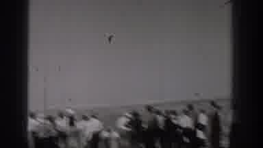 Washington USA (1938): People Looking At Tricks A Plane Does In The Air