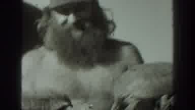 California USA (1939): Man With Thick Bushy Beard Shows Two Tortoises In Chains