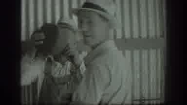 California USA (1939): 2 Guys Hanging Outside The Others Along The Side Being
