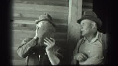 California USA (1939): A Man Drinking The Water And Then Giving Water For Someone