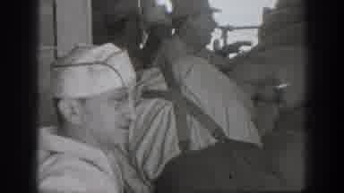 California USA (1939): Hard Working Man Working Opening Sacks Helping Each Other