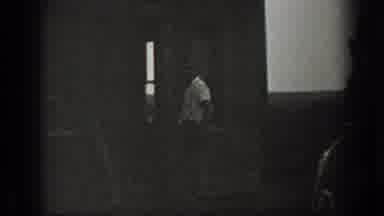California USA (1939): Two Men S Are Talking In The Dark Room