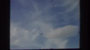 California USA (1939): Showing A Plane Flying Through The Sky And Then Children