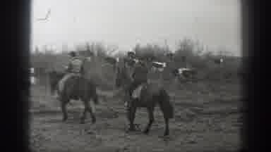 Montana USA (1939): Men Riding Horses Outside