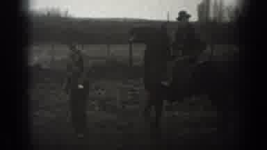 Montana USA (1939): Man On His Horse Surveying The Activities On His Farm On A