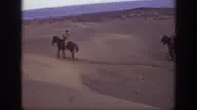 Montana USA (1939): A Cowboy On His Horse Is Riding As Two Others On Horses