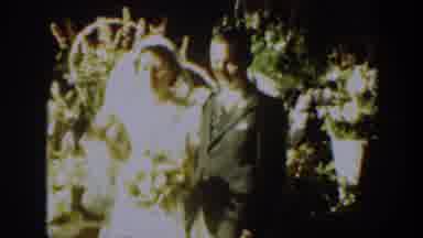 Montana USA (1939): Bride Laughs Smiles At Man Looking At Flowers And At Camera