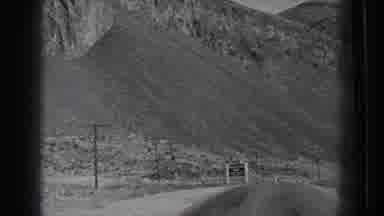 Washington USA (1939): Driving Down A Long Road With Mountains, Hills And Grass