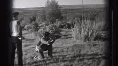 Washington USA (1939): A Father Teaching His Two Sons How To Shoot A Rifle
