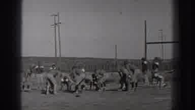 Washington USA (1939): On A Field Outside During The Day Boys Playing Football