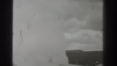 Wyoming USA (1939): Clouds In An Old Place In A Small Town With A Statue