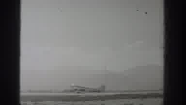 Wyoming USA (1939): An Airplane Is Taking Off For Flight As Few People Walk By