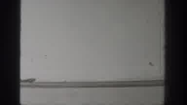 Wyoming USA (1939): An Aeroplane Is Ready To Fly Near The River And Something Is